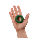 Shaft Model R C Ring Green Size 2 held in hand, showcasing flexible liquid silicone design for comfort and secure fit.