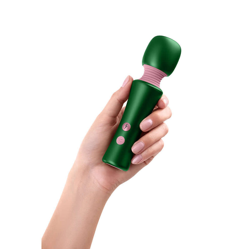 FemmeFunn Bougie Wand Massager Green held in hand, showcasing its elegant design and powerful features.