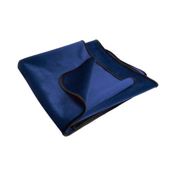 Liberator Fascinator Mini Waterproof Throw Blanket Blue folded and ready for use.