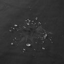 Waterproof surface showing droplets on the Liberator Fascinator Waterproof Throw Travel Blanket Black.