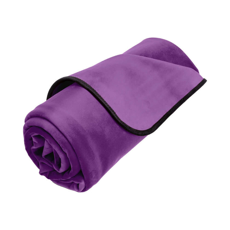 Liberator Fascinator Waterproof Throw Travel Blanket Purple rolled up for mess-free passion anywhere.