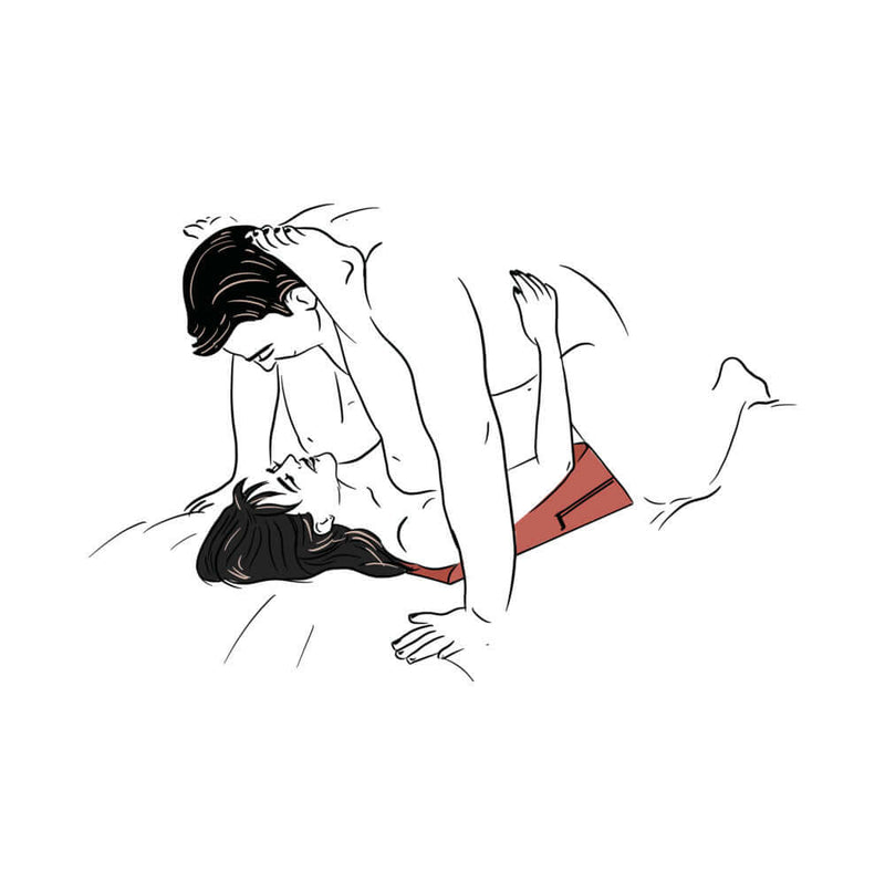 Couple using the Liberator Wedge Sex Pillow Black for enhanced intimacy and new positions.