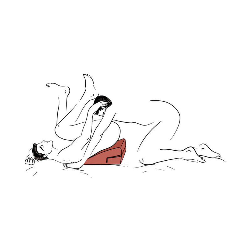 Couple enjoying intimacy on the Liberator Wedge Sex Pillow Black, showcasing comfort and support for new positions.