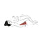 Couple using the Liberator Wedge Sex Pillow Black in an intimate position on a bed.