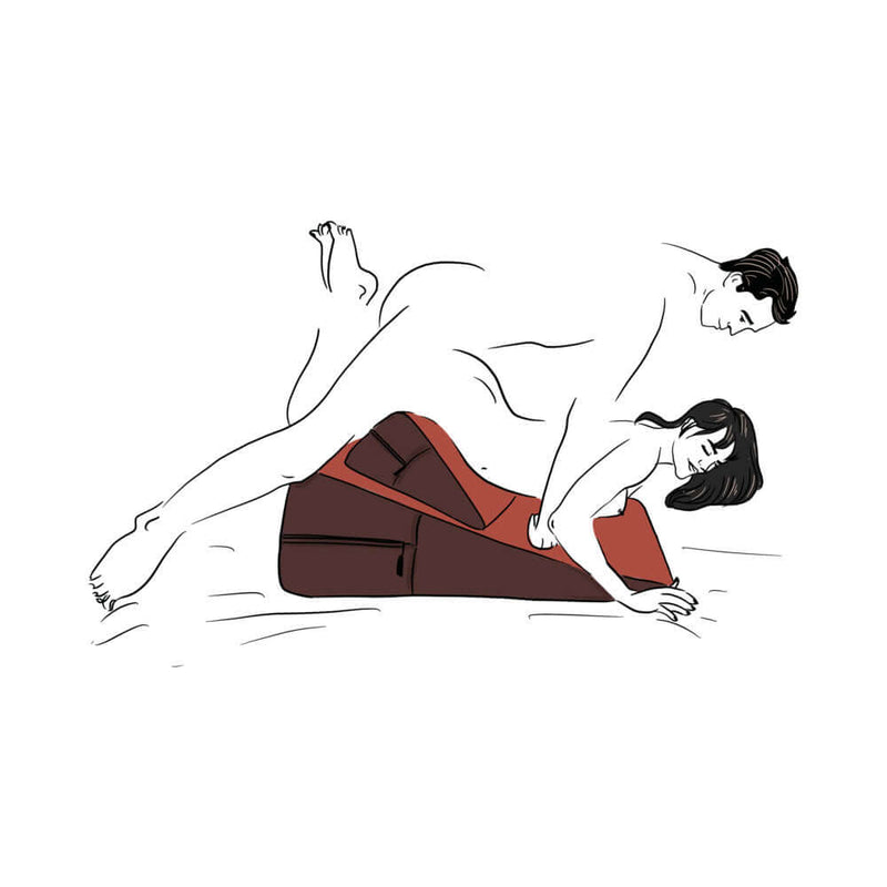 Couple using the Liberator Black Label Wedge Ramp Combo Microfiber Gray for intimate exploration and pleasure.