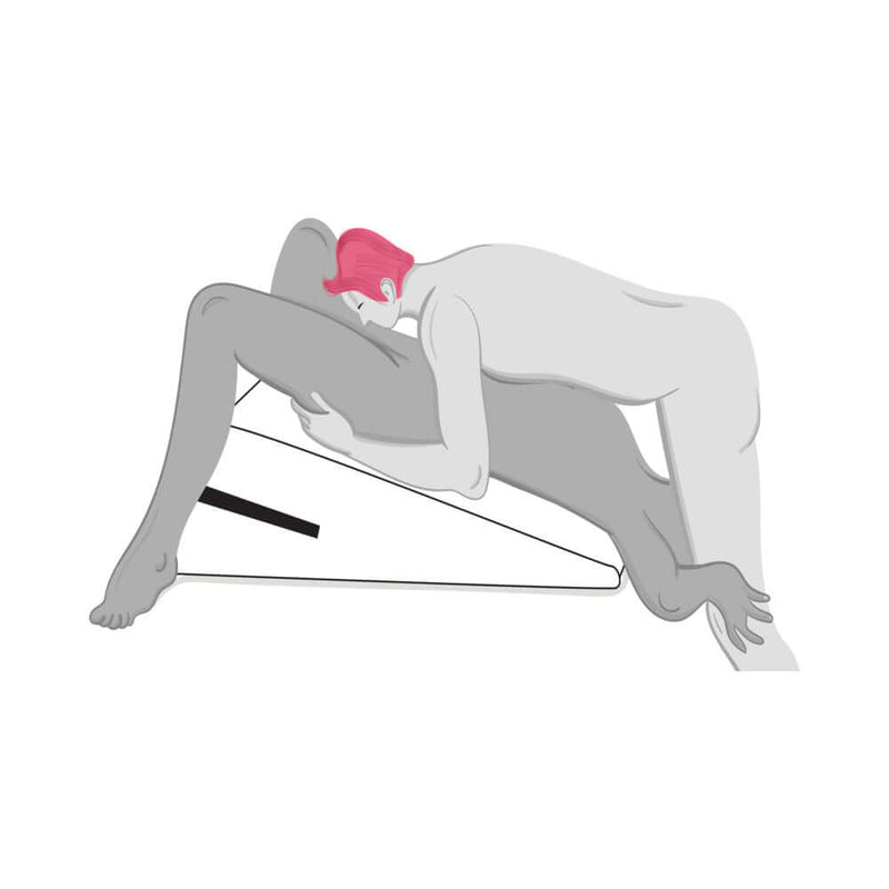 Couple using the Liberator Ramp Sex Positioning Pillow Original Red for enhanced intimacy and comfort in various positions.