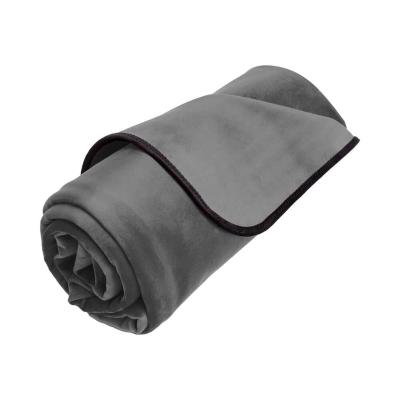 Liberator Fascinator Waterproof Throw Travel Blanket Gray folded and rolled for easy transport and storage.