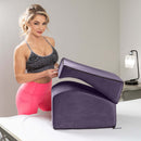 Liberator Flip Ramp Sex Positioning Pillow Plum displayed with a model, showcasing its discreet and versatile design.
