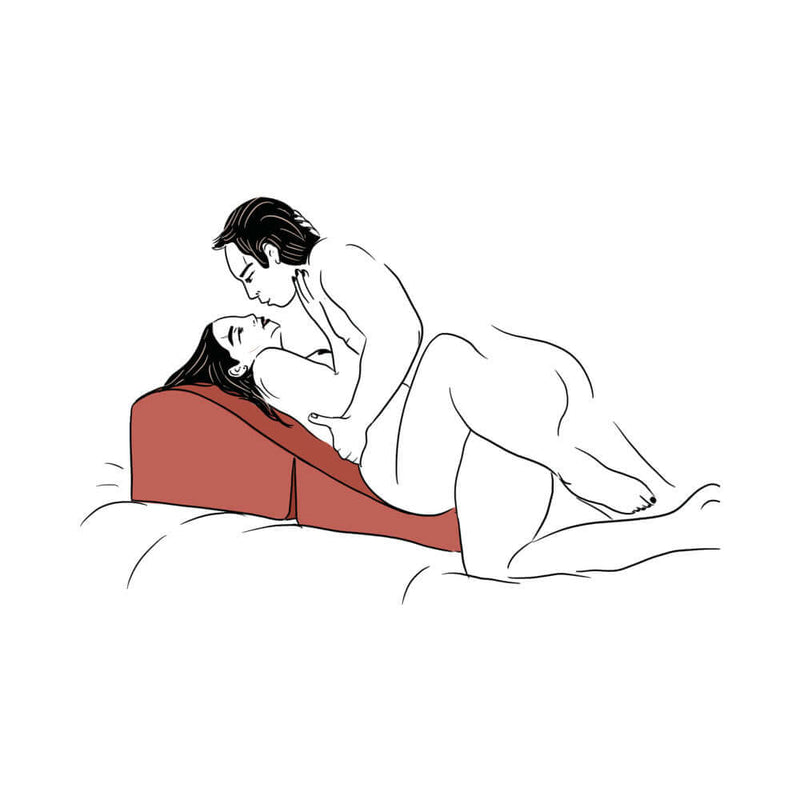 Couple using the Liberator Flip Ramp Sex Positioning Pillow Merlot for intimate play and comfort.