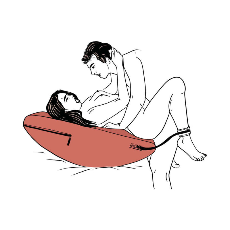 Liberator Scoop Rocker Valkyrie Edition with Cuffs Grey in use for enhanced intimacy and pleasure.