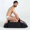 Liberator Scoop Rocker Valkyrie Edition with Cuffs Plum showcasing a man seated with cuffs in a dynamic position.