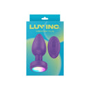 Luv Inc Pr17 Vibrating Butt Plug With Remote Purple packaging featuring a sleek purple silicone design and wireless remote.