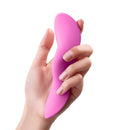FemmeFunn Unda Panty Vibrator Pink held in hand, showcasing its sleek and ergonomic design.