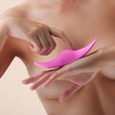 FemmeFunn Unda Panty Vibrator Pink held in hands, showcasing its ultra-slim design and vibrant color.