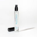 Eye Of Love Bloom Attract Her Pheromone Parfum Blue Ember bottle on a white background.