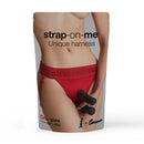 Strap-on-me Harness Lingerie Unique One Size Red packaging displaying a model in a red harness with discreet rings.
