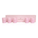 HighOnLove Mini Sensual Massage Candles Collection shown in elegant pink packaging with five mini candles.
