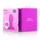 b-Vibe Rimming Petite Rotating Remote Control Plug Fuchsia packaging and product on display.