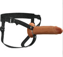 Brown silicone hollow strap-on with adjustable harness for comfort and functionality.