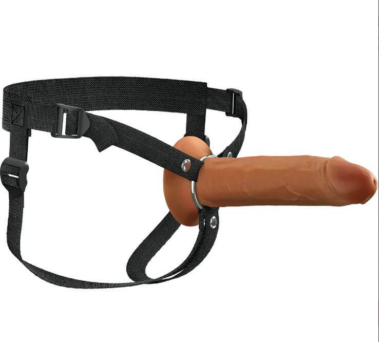 Brown silicone hollow strap-on with adjustable harness for comfort and functionality.