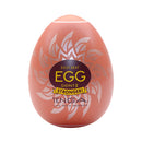 Tenga Egg Shiny II Disposable Stroker White packaging with bold sun design and branding.