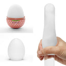 Tenga Egg Combo Disposable Masturbator White displayed from various angles, showcasing its compact design and texture.