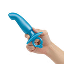 b-Vibe Butties Hither Silicone Prostate Plug held in hand, showcasing its ergonomic design and smooth silicone texture.