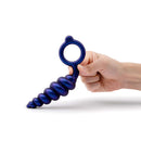 b-Vibe Beaded Butties Bundle 3-Piece Anal Plug Set held in hand, showcasing its spiral design and ergonomic ring.