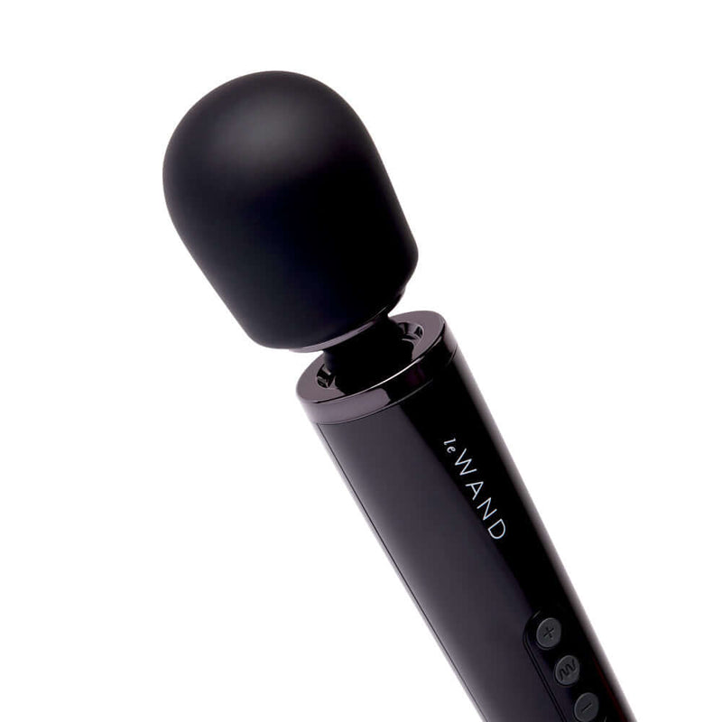 Le Wand Plug-In Vibrating Massager Black close-up showing sleek design and soft head for maximum comfort.