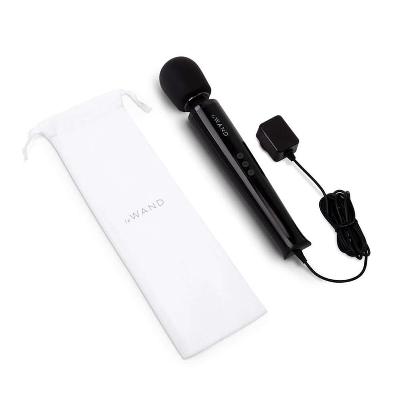 Le Wand Plug-In Vibrating Massager Black with accessory pouch and plug-in cord.