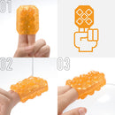 Tenga Uni Diamond Unisex Masturbation Sleeve Clear in use on fingers for enhanced pleasure and stimulation.