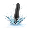 Mystim Real Deal Neal eStim Vibrator Black splashing in water showcasing its sleek design and powerful features.