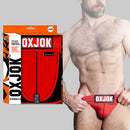 Oxballs Oxjok Slingjock Upthrust Slider-strap Jock Red Hot L displayed on muscular male model with packaging.