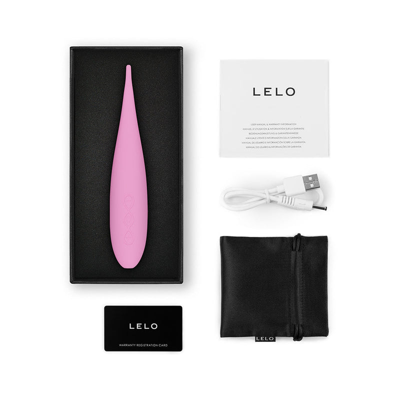 LELO DOT Travel Clitoral Pinpoint Vibrator Pink in its packaging with accessories and user guide.