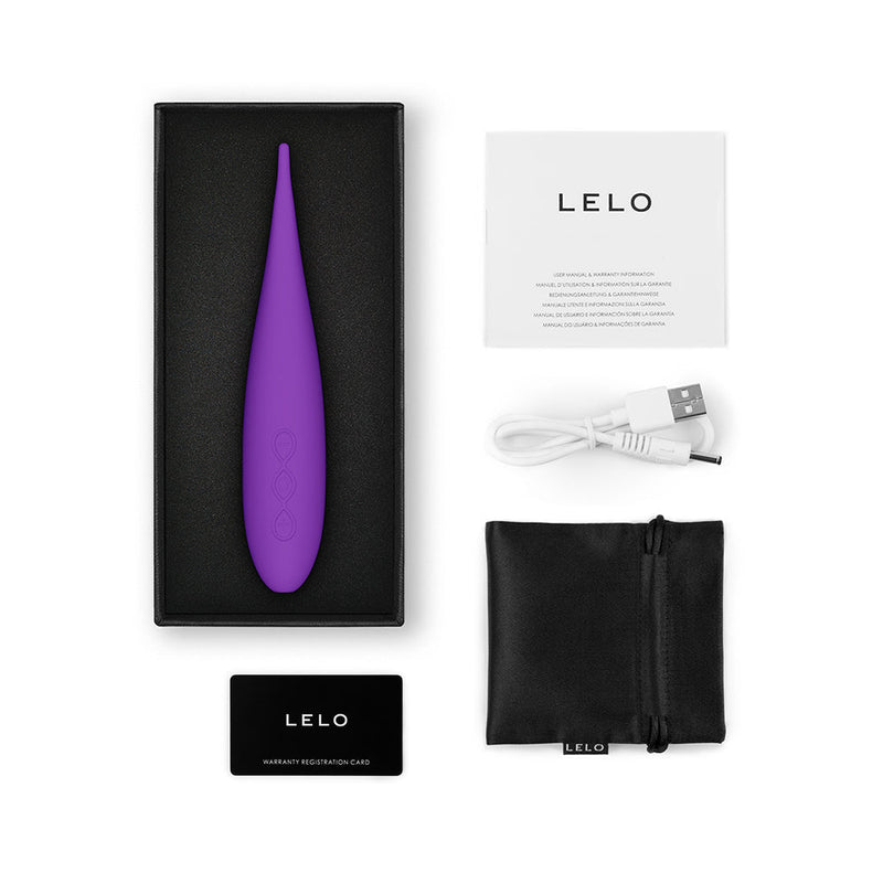 LELO DOT Travel Clitoral Pinpoint Vibrator Purple in elegant packaging with accessories and USB charging cable.