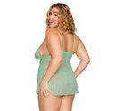Woman wearing Eyelash Lace Babydoll Set in Seafoam with delicate gold chain and butterfly charm, showcasing adjustable straps and dot mesh fabric.
