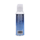 Evolved Glisten Silicone Lubricant 2 Oz bottle with clear silicone personal lubricant, blue label, and detailed instructions.