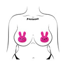 Pastease Pink Marshmallow Easter Bunny Nipple Pasties on a silhouette wearing a bikini top.