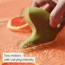 OhNut Kiwi Vibrating Personal Massager Green in water showcasing two motors with varying intensity.