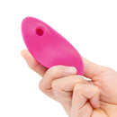 Together Couples Suck N Go Pink sleek stimulator held in hand for solo or partner pleasure.