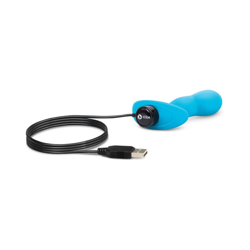 b-Vibe Vibrating P-Spot Snug Plug Small with Remote Control in blue, featuring a USB charging cable for convenience.