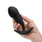 b-Vibe Vibrating P-Spot Snug Plug Large with Remote Control held in hand, showcasing its ergonomic design.
