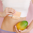 Sweetums Intimate Wipes Mango Flavor 10 Pack with model holding a mango and a wipe.