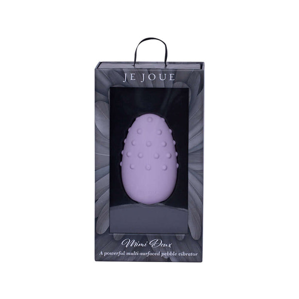 Je Joue Mimi Deux Double Sided Clitoral Vibrator Lilac in packaging with soft pleasure dots.