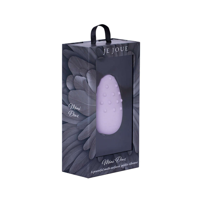 Je Joue Mimi Deux Double Sided Clitoral Vibrator Lilac in packaging, showcasing its elegant design and rounded pleasure dots.