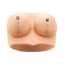 Adam & Eve Eve's Naughty Weighted Nipple Clips Silver on realistic silicone model with elegant beaded weights.