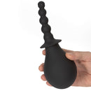 Adam & Eve Smooth & Easy Silicone Douche in hand, featuring a soft silicone construction for comfortable use.