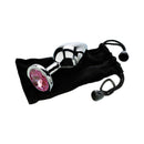 Adam & Eve Pink Gem Anal Plug Medium with a shiny aluminum body and pink jewel detail, resting on a soft black pouch.