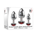 Adam & Eve Three Hearts Gem Anal Plug Set featuring small, medium, and large aluminum plugs with heart jewels.