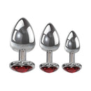 Adam & Eve Three Hearts Gem Anal Plug Set featuring three graduated aluminum plugs with red heart jewels